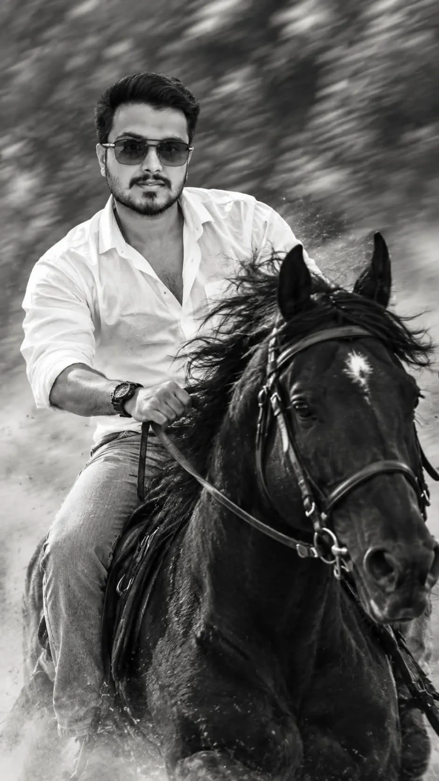 cinematic photo of a young man riding a black horse