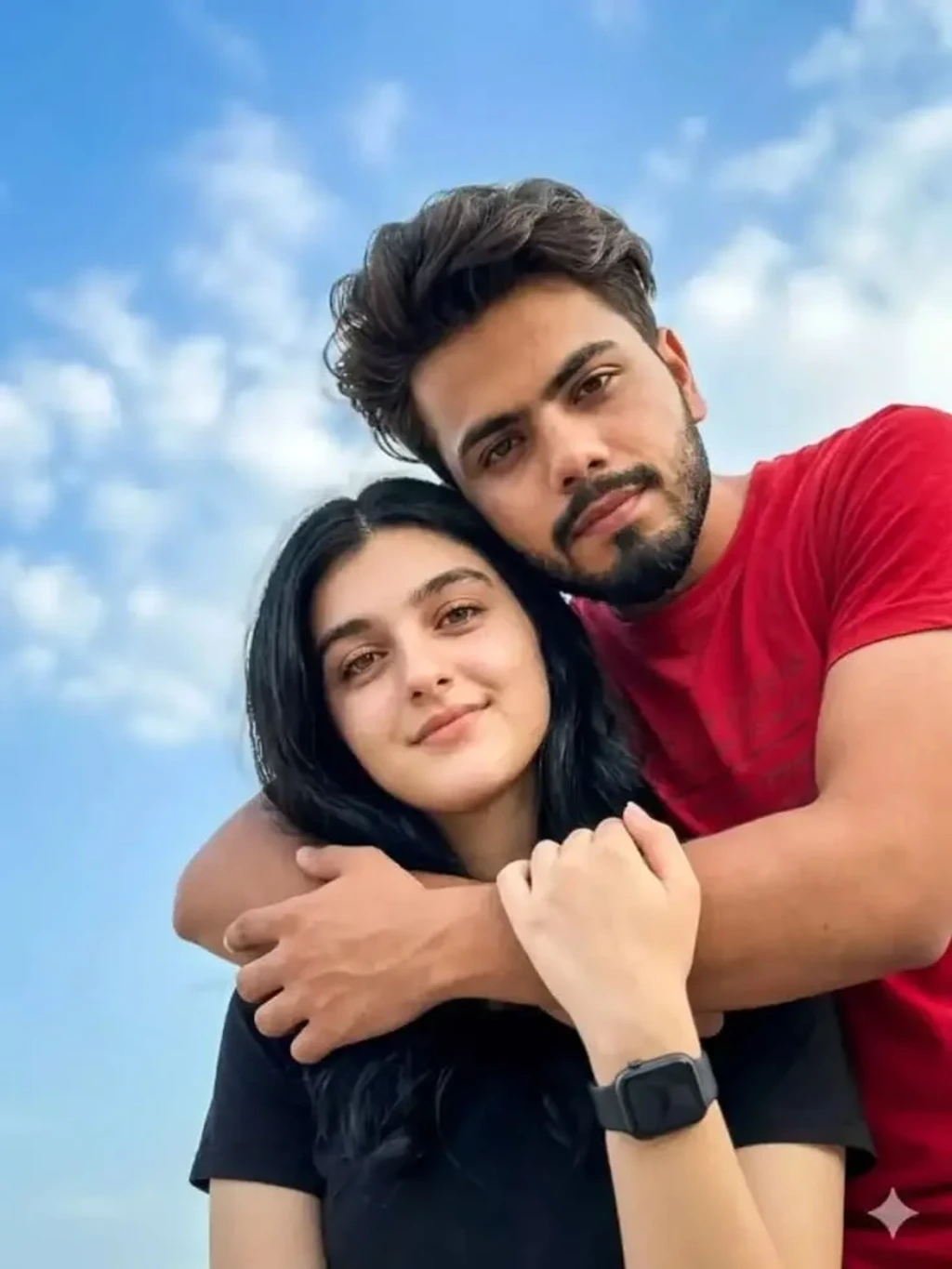 Romantic Candid Couple Portrait Under Bright Blue Sky with Back Hug