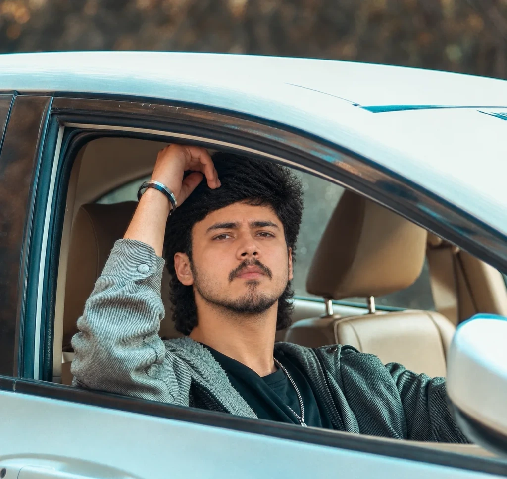 Cinematic Car Window Portrait – Realistic Male Lifestyle Photography