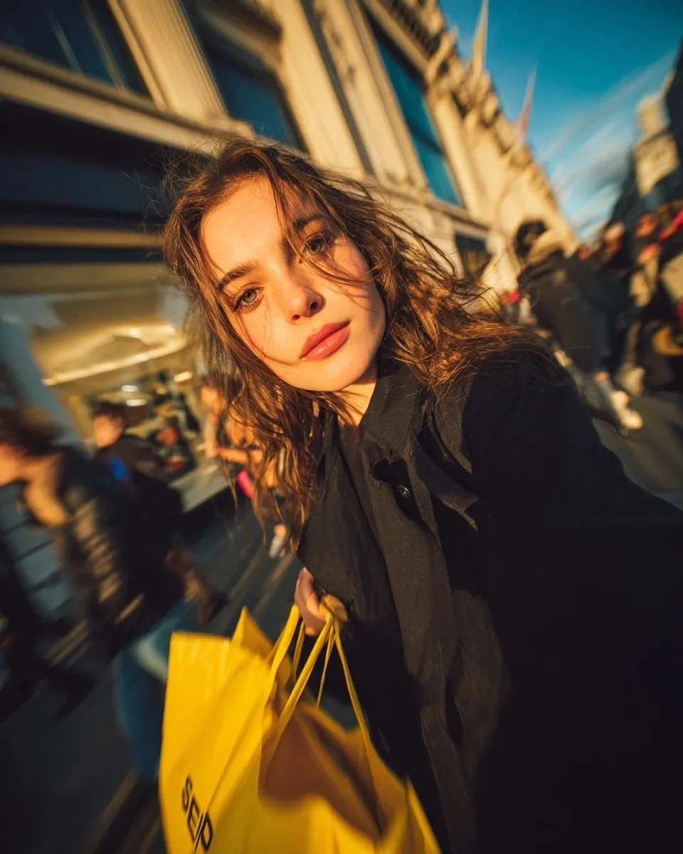 Cinematic street portrait of a young woman walking