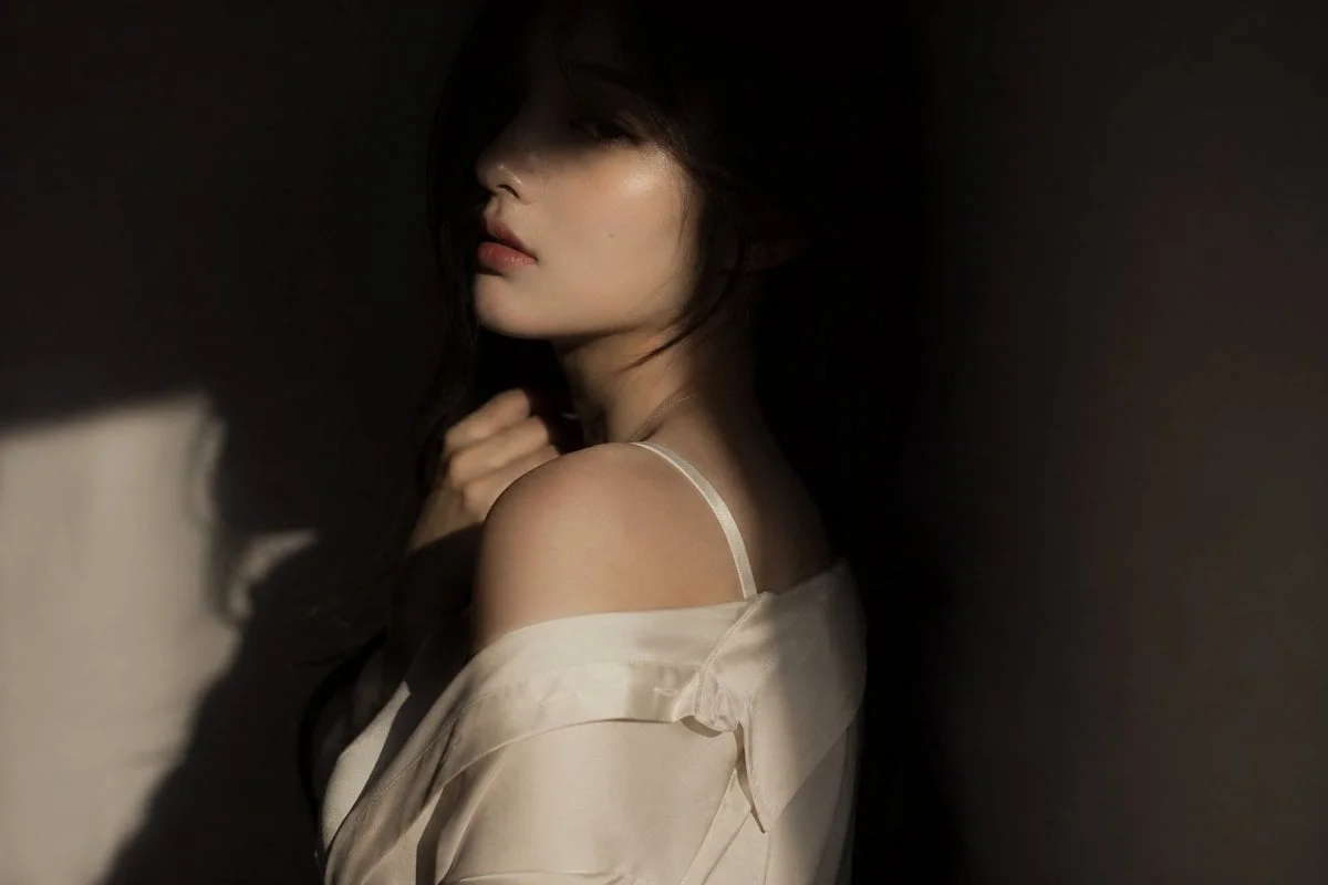 editorial portrait Korean female idol subtly sensual