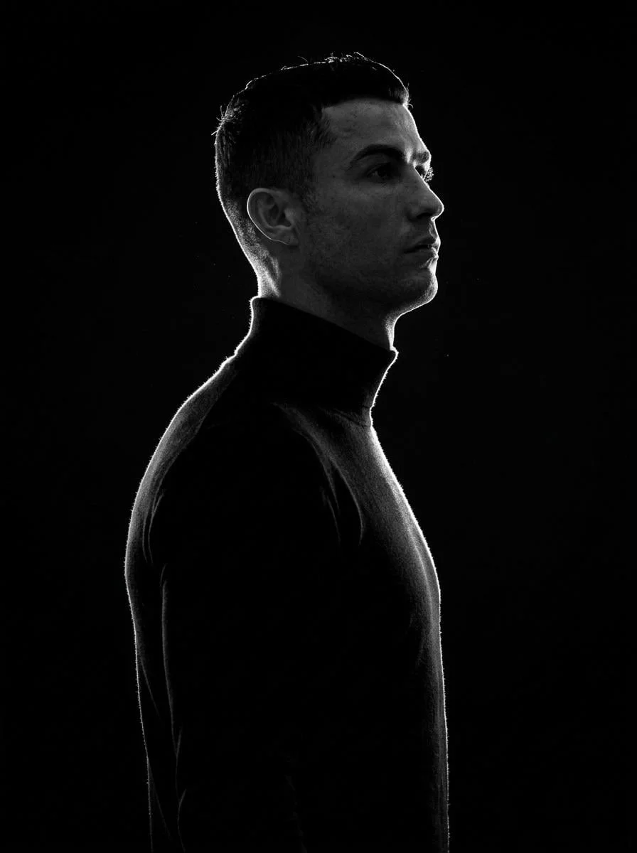 A minimalist black and white cinematic portrait