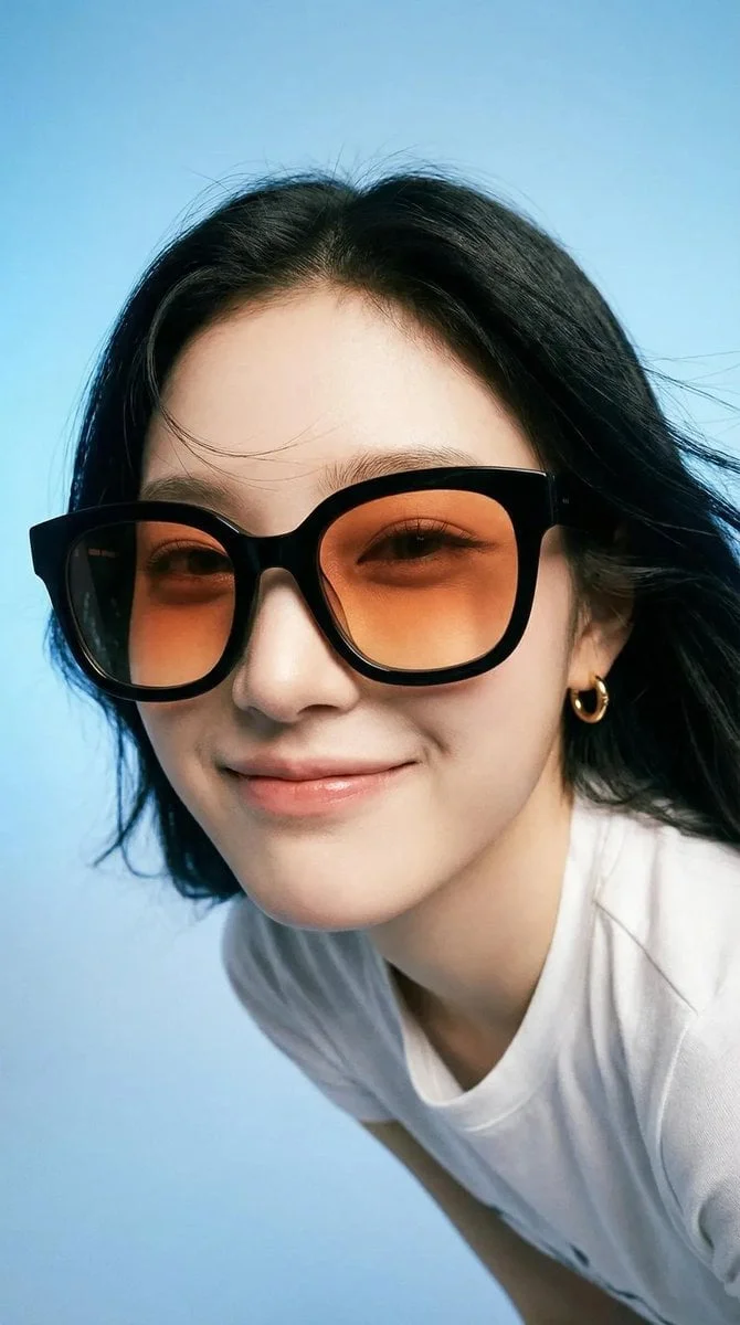 Photorealistic editorial portrait of a smiling woman